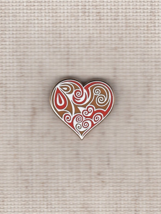 red swirl heart needle minder