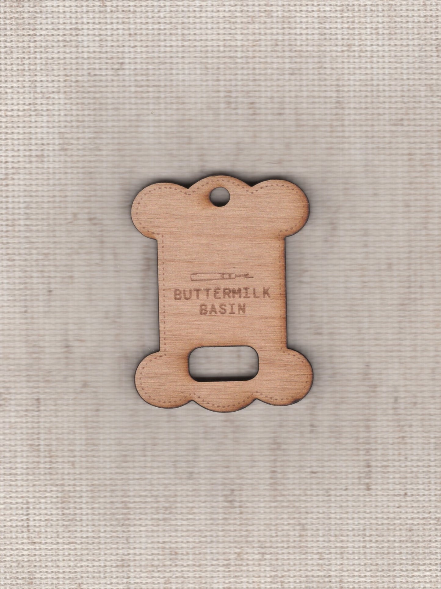 wooden floss bobbin and floss drop