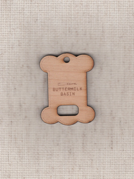 wooden floss bobbin and floss drop