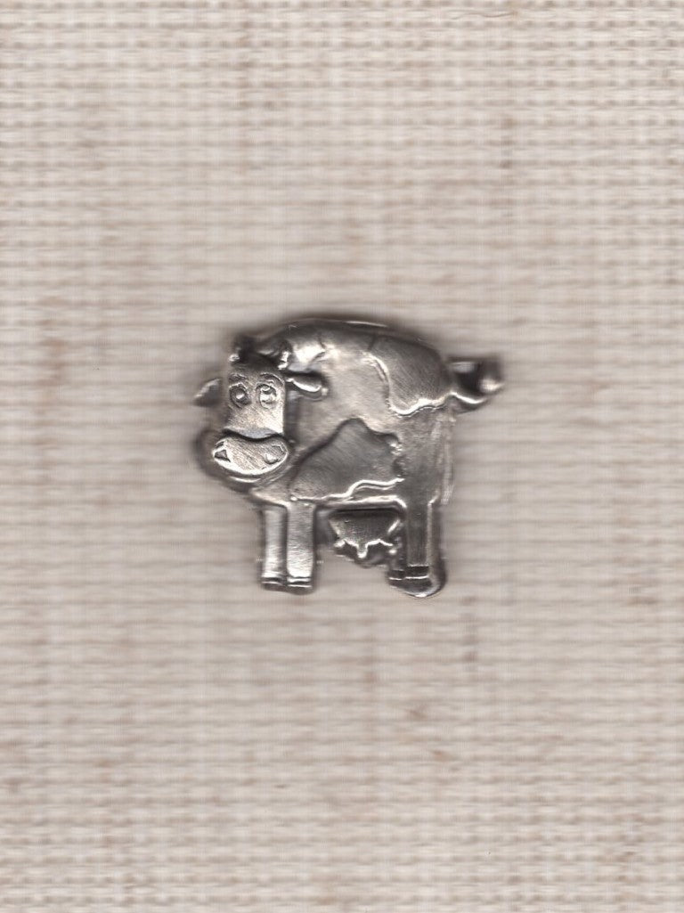cow needle minder
