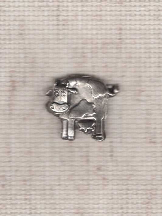 cow needle minder